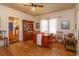 Bright dining room with hardwood floors and a wooden table at 133 Agnes St, Winter Garden, FL 34787