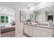 Elegant bathroom with single vanity and access to bedroom at 1429 Swift Ct, Kissimmee, FL 34759