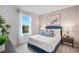 Cozy bedroom with a full-size bed and natural light at 1429 Swift Ct, Kissimmee, FL 34759