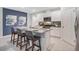 Modern kitchen with an island and granite countertops at 1429 Swift Ct, Kissimmee, FL 34759
