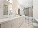 Elegant bathroom with a double vanity, soaking tub, and walk-in shower at 1500 Russell Ave, Orlando, FL 32806