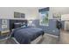 Bedroom with a blue theme and built-in wall accents at 1708 Columbus Path, St Cloud, FL 34771