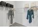 Large walk-in closet with shelving and hanging rods at 1708 Columbus Path, St Cloud, FL 34771
