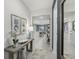 Bright and spacious entryway with a console table and mirror at 1708 Columbus Path, St Cloud, FL 34771