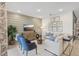Spacious living room with a sectional sofa and a wood-paneled accent wall at 1708 Columbus Path, St Cloud, FL 34771