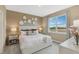Spacious main bedroom with king bed and large window at 1708 Columbus Path, St Cloud, FL 34771