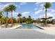 Community pool with lounge chairs and umbrellas at 236 Wise Owl Way, Winter Springs, FL 32708