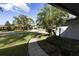 Landscaped walkway leading to the front entrance of the home at 2778 N Horizon Pl, Oviedo, FL 32765