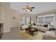 Living room with vaulted ceilings, neutral decor and plenty of natural light at 3334 S Saint Lucie Dr, Casselberry, FL 32707