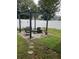 Cozy patio with pergola, seating, and a fenced yard at 378 Southern Charm Dr, Orlando, FL 32807