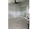 Living room with tile floors and a large mirror at 378 Southern Charm Dr, Orlando, FL 32807