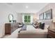 Main bedroom with large window and plenty of natural light at 418 St Johns Ln, Kissimmee, FL 34759