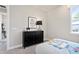 bedroom with black dresser and alphabet print at 5559 Flame Vine Way, Saint Cloud, FL 34771