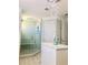 Modern bathroom with a large walk-in shower and a floating vanity at 9859 Winnington St, Orlando, FL 32832