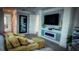 Bright bedroom featuring a fireplace and comfortable seating at 9859 Winnington St, Orlando, FL 32832