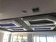 Detailed tray ceiling with recessed lighting and blue accents at 9859 Winnington St, Orlando, FL 32832
