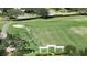 Aerial view of a driving range with people practicing at 9859 Winnington St, Orlando, FL 32832
