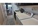 Spacious laundry room with ample storage and modern appliances at 9859 Winnington St, Orlando, FL 32832