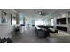 Open floor plan living room with modern fireplace and kitchen at 9859 Winnington St, Orlando, FL 32832