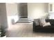 Living room with gray walls, dark staircase and sofa at 9859 Winnington St, Orlando, FL 32832