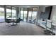 Home office with built-in shelving and balcony access at 9859 Winnington St, Orlando, FL 32832