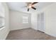 Well-lit bedroom featuring a ceiling fan and large closet at 1333 Orchid Ave, Winter Park, FL 32789