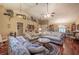 Bright living room featuring hardwood floors and a cozy seating arrangement at 328 Sterling Rose Ct, Apopka, FL 32703