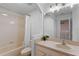 Bathroom with a beige bathtub and vanity at 3932 White Birch Run, Winter Springs, FL 32708