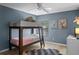 bedroom with a bunk bed and neutral color scheme at 3932 White Birch Run, Winter Springs, FL 32708