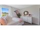 Bedroom with pink bedding, window, and dresser at 5498 Hayloft Dr, Apopka, FL 32712