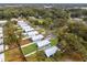 Aerial view of neighborhood, showcasing homes and surrounding area at 626 Nw 9Th Ave, Webster, FL 33597