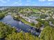 Condo building located on the waterfront with tennis courts nearby at 6312 Masters Blvd # O2, Orlando, FL 32819