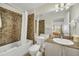 Bathroom with shower/tub combo and granite vanity at 7383 Universal Blvd # 512, Orlando, FL 32819