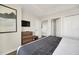 Main bedroom with a dresser, and access to other rooms at 7383 Universal Blvd # 512, Orlando, FL 32819