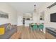Living area with sofa and dining area view at 7383 Universal Blvd # 512, Orlando, FL 32819