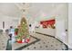 Elegant lobby with Christmas tree and seating area at 7383 Universal Blvd # 512, Orlando, FL 32819