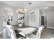 Modern dining room with an open floor plan and a shiplap accent wall at 824 Maumee St, Orlando, FL 32828