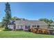 Single-story home with a well-manicured lawn and landscaping at 1084 Villa Ln # 72, Apopka, FL 32712
