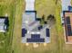 House with solar panels, viewed from above at 1110 Seminole Dr, Kissimmee, FL 34744