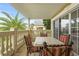 Spacious balcony with table and chairs, perfect for outdoor dining at 1370 Centre Court Ridge Dr # 304, Kissimmee, FL 34747