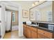 Bathroom with granite vanity and shower/tub combo at 1370 Centre Court Ridge Dr # 304, Kissimmee, FL 34747