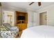 Bedroom with ensuite bathroom and built-in TV at 1370 Centre Court Ridge Dr # 304, Kissimmee, FL 34747
