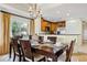 Dining area with kitchen access and large windows at 1370 Centre Court Ridge Dr # 304, Kissimmee, FL 34747