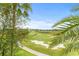Scenic view of a golf course from an elevated position at 1370 Centre Court Ridge Dr # 304, Kissimmee, FL 34747