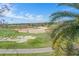 Stunning view of the golf course with lush greens and fairways at 1370 Centre Court Ridge Dr # 304, Kissimmee, FL 34747