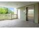 Condo hallway with elevator and balcony access at 1370 Centre Court Ridge Dr # 304, Kissimmee, FL 34747