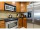 Well-equipped kitchen featuring stainless steel appliances at 1370 Centre Court Ridge Dr # 304, Kissimmee, FL 34747
