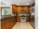 Modern kitchen with stainless steel appliances and ample cabinetry at 1370 Centre Court Ridge Dr # 304, Kissimmee, FL 34747