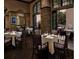 Elegant dining area with stone accents and large windows at 1370 Centre Court Ridge Dr # 304, Kissimmee, FL 34747