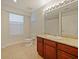 Bathroom with single sink vanity and tiled floors at 225 W Seminole Blvd # 206, Sanford, FL 32771